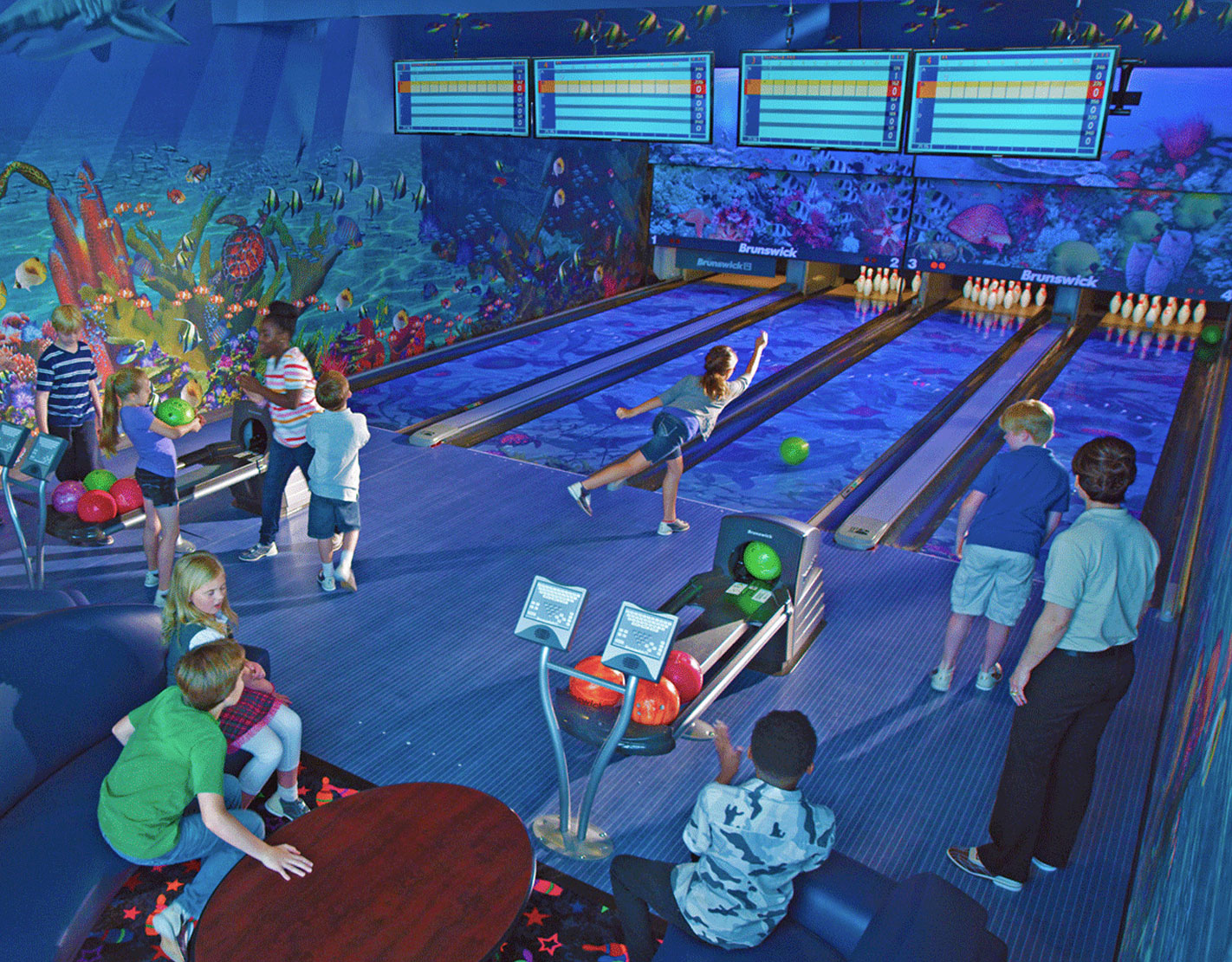 Kids bowling at summer camp